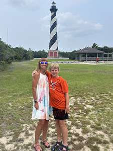 Mrs. Kris Young with her son at the Hatteras Lighthouse